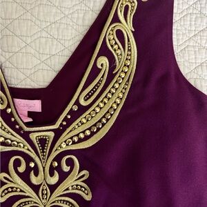 Cute maroon top. Perfect for fall and summer for any event.